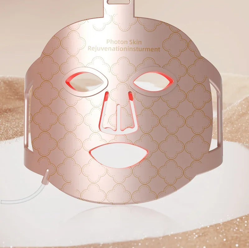 Rose-gold soft silicone LED face mask front view with eye nose and mouth openings
