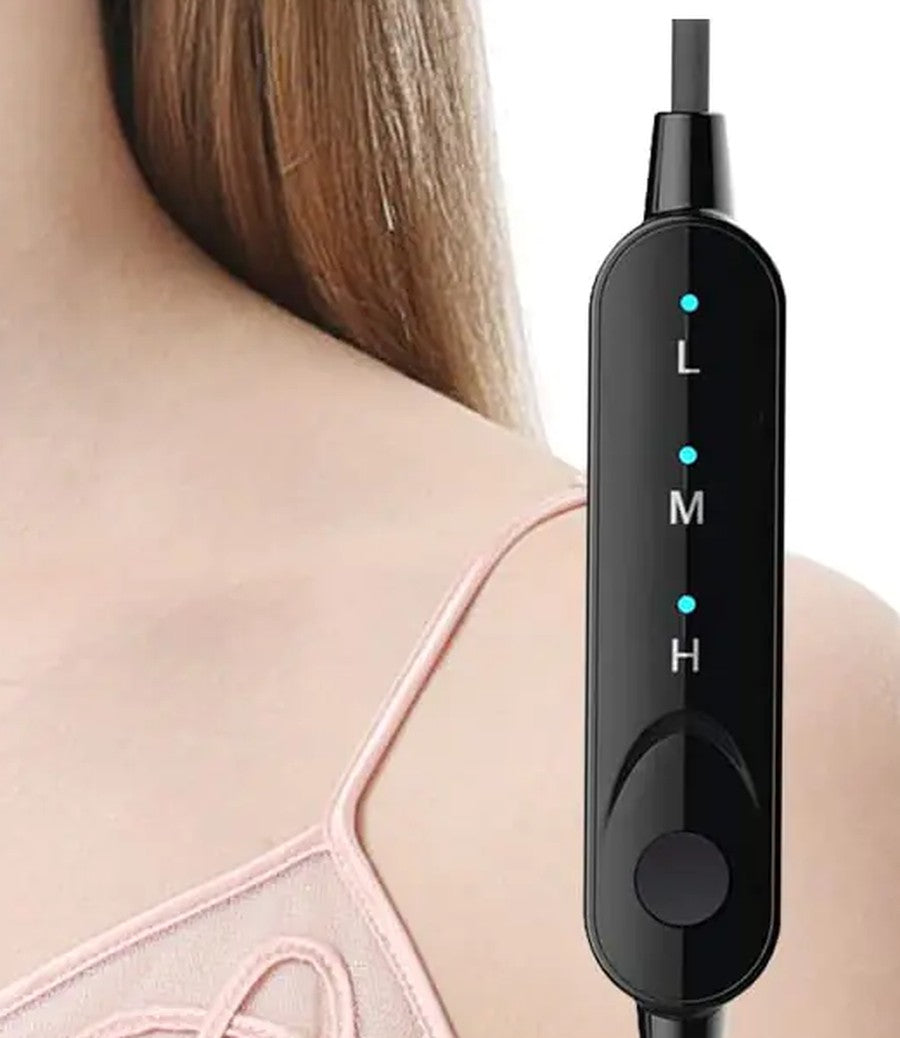 Close-up of the heated eye mask's inline USB controller showing the three warmth settings — Low, Med, and High — with a single control button.