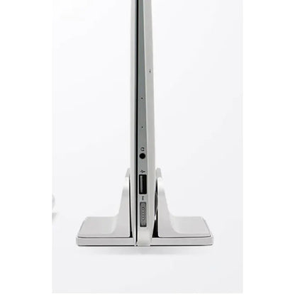 Side view showing the wide footprint base keeping the laptop planted and stable