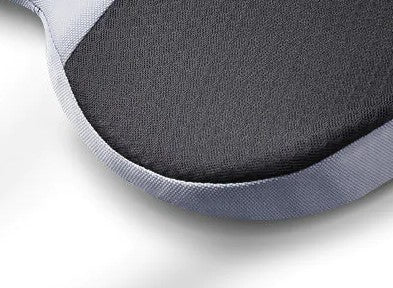 Close-up of the cushion's breathable mesh top and grey piped non-slip edge — memory foam construction detail.